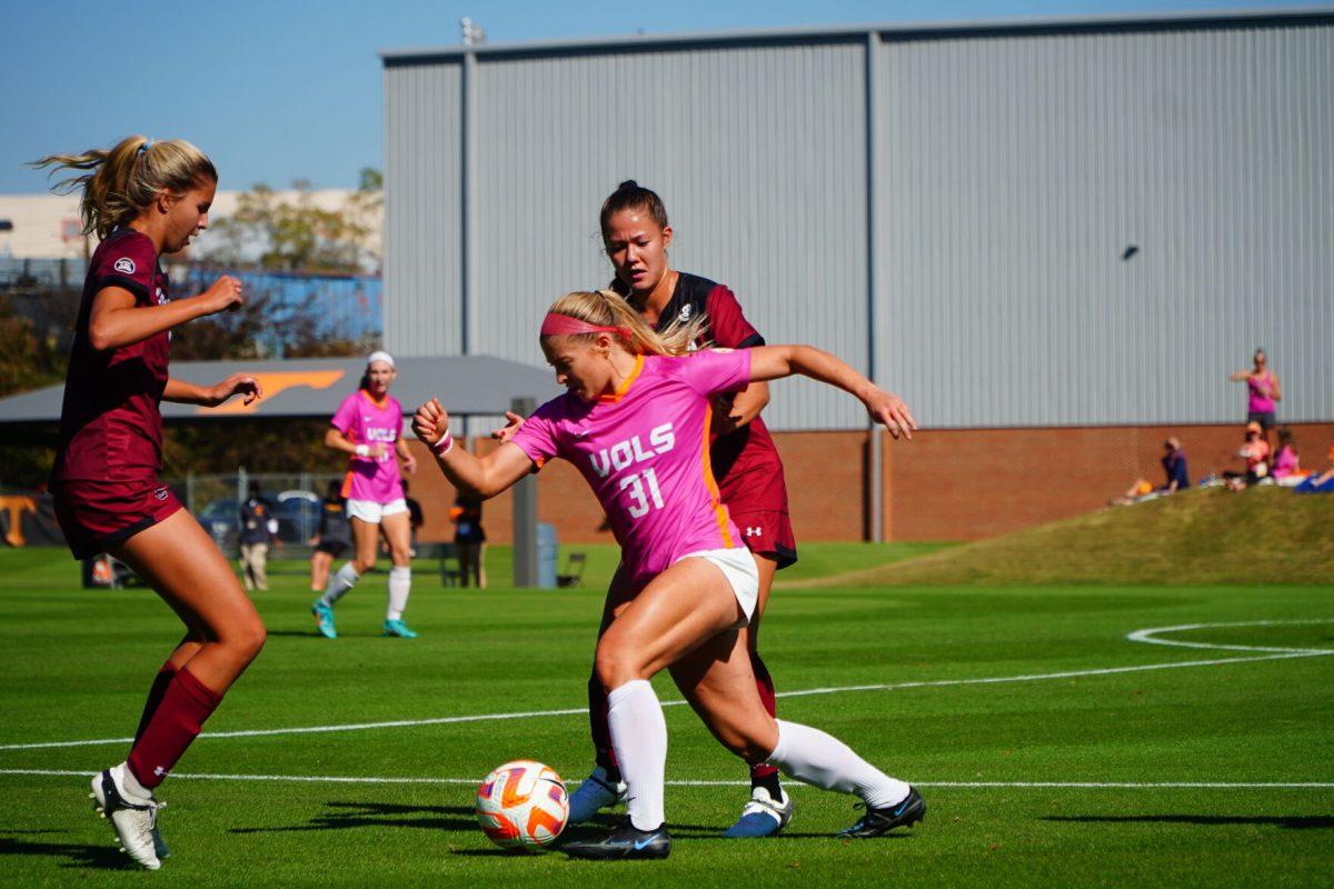 KNOXVILLE, TN - No. 31 Mackenzie George dribbles past the defense during the game against the University of South Carolina at the Regal Soccer Stadium. Sunday, Oct. 23, 2022.