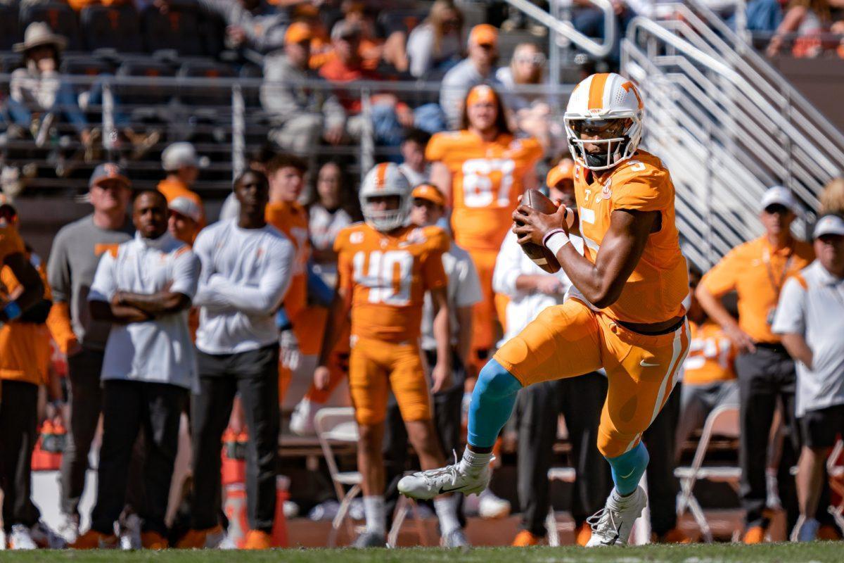 KNOXVILLE, TN - No. 5 Hendon Hooker runs the ball on an offensive play against UT Martin in Neyland Stadium. Oct. 22, 2022. 