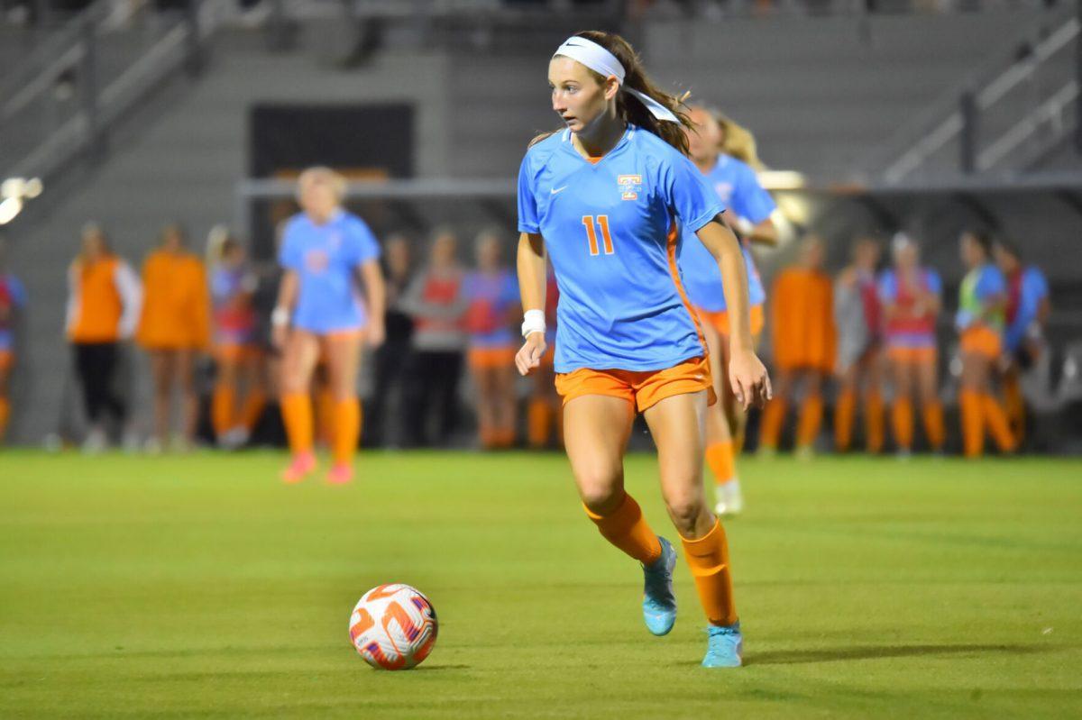 KNOXVILLE, TN - No. 11 Jordan Fusco dribbles the ball down field during the game against LSU at the Regal Soccer Stadium on Friday, Oct. 14, 2022.
