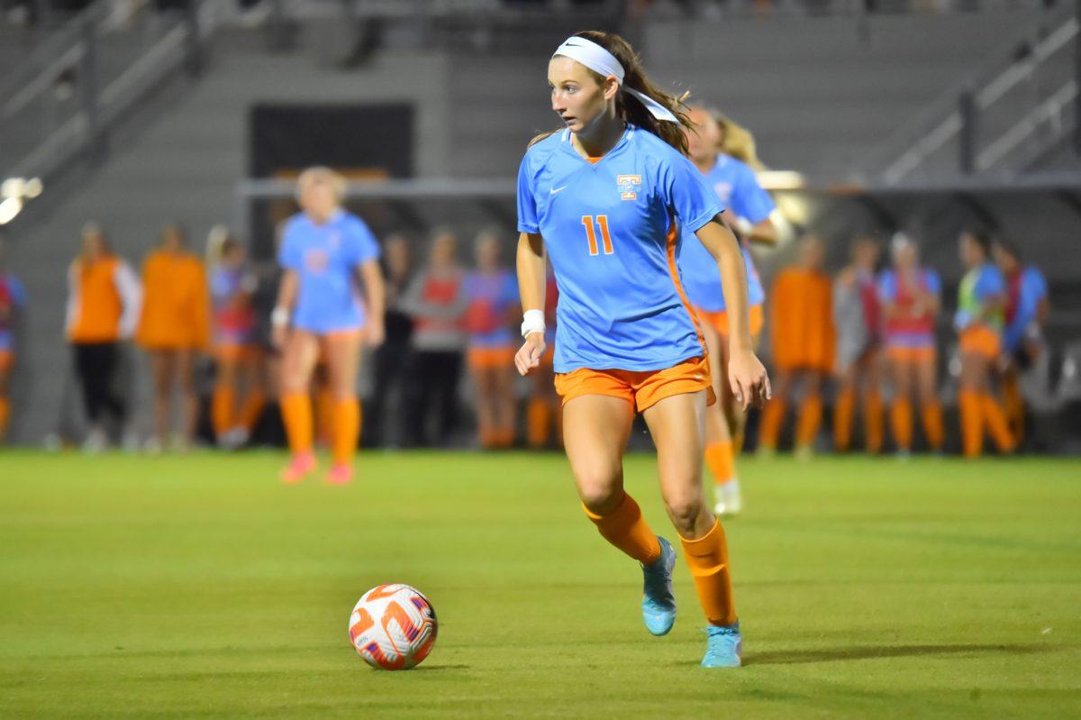 KNOXVILLE, TN - No. 11 Jordan Fusco dribbles the ball down field during the game against LSU at the Regal Soccer Stadium on Friday, Oct. 14, 2022.