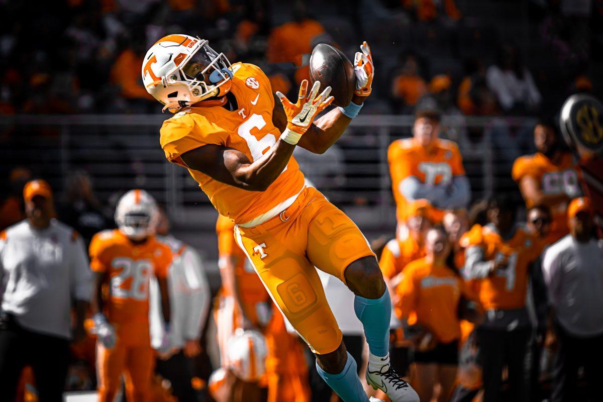 KNOXVILLE, TN - No. 6 wide receiver Jimmy Holiday completes a pass in Neyland Stadium during the game against UT Martin on Saturday Oct. 22, 2022. 