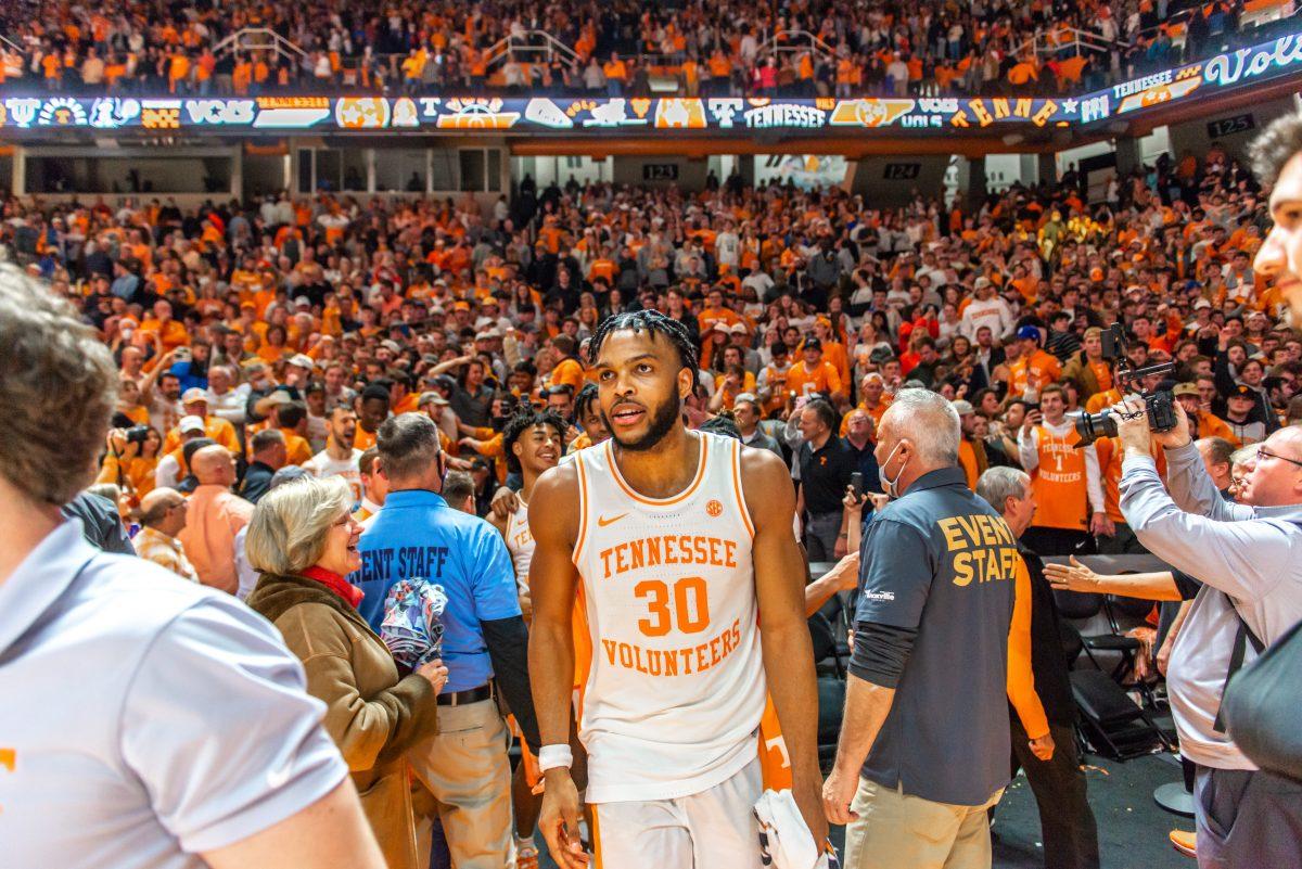 No. 30 Josiah-Jordan James celebrates amongst the crowd in Thompson Boling Arena after the Volunteers defeat Auburn on Saturday Feb 26, 2022.