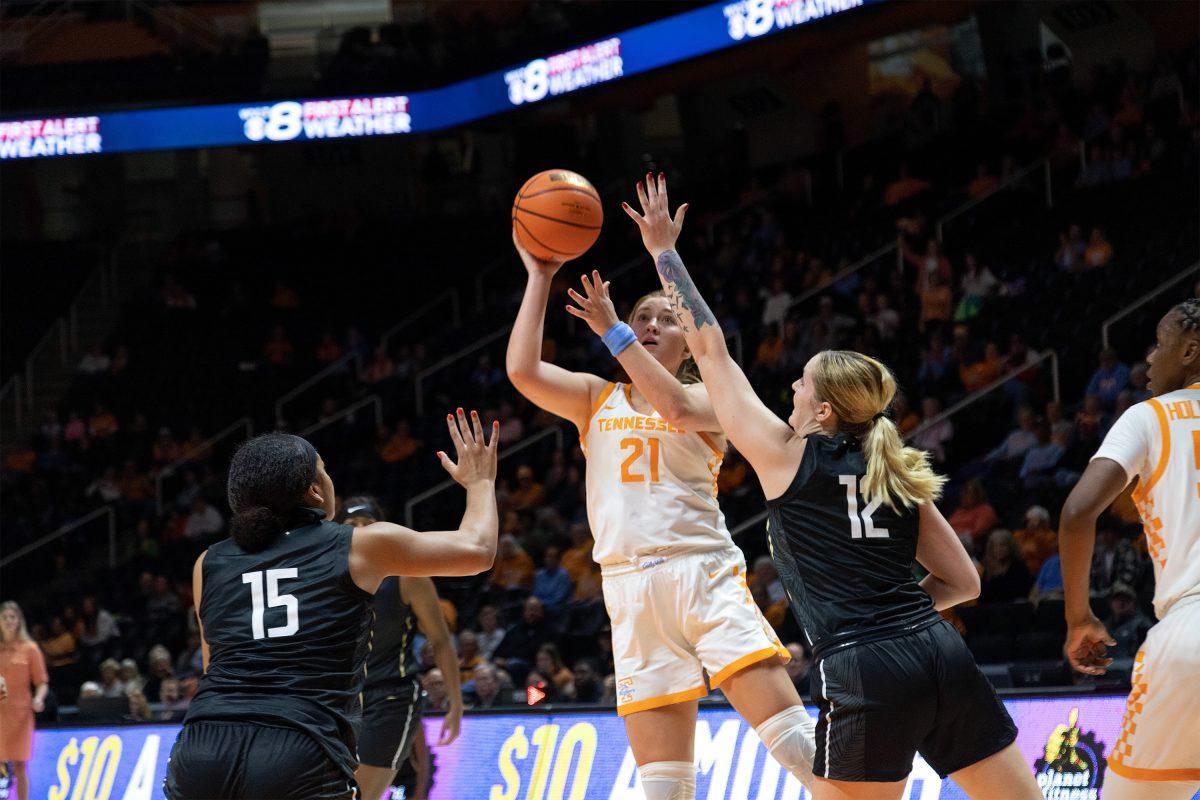 No. 21 Tess Darby shoots a contested jumper against UCF at Thompson-Boeing Arena. Wednesday Nov.14, 2022.