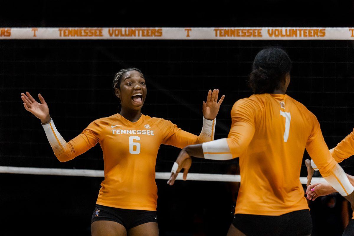 KNOXVILLE, TN - No. 6 Erykah Lovett and No. 7 Morgahn Fingall celebrate winning the third set in a row against The Citadel to win the match on Saturday Sept. 10, 2022.