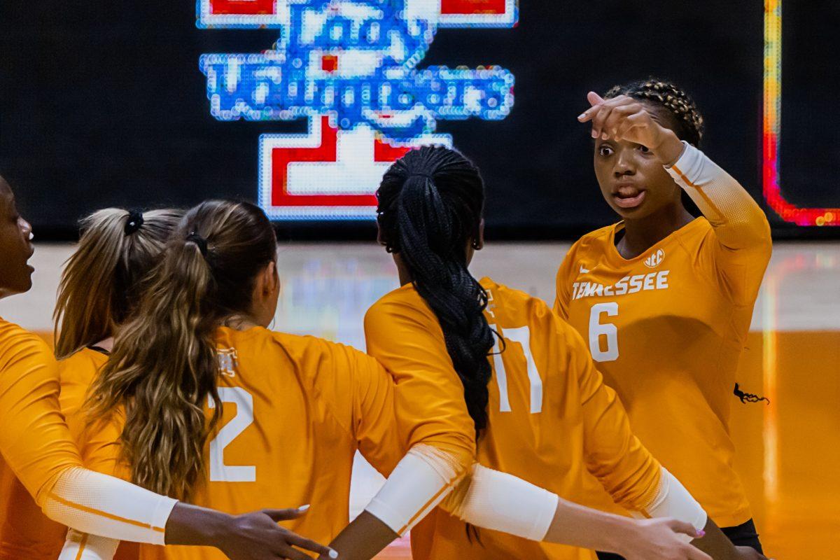 KNOXVILLE, TN - No. 6 Erykah Lovett celebrates with the Lady Vols after ending the sweep against The Citadel scoring 12 kills, earning a sport on the all-tournament team. Saturday Sep. 10, 2022.