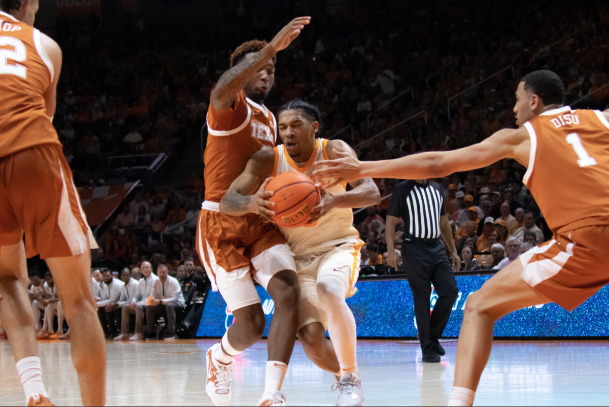 Zakai Zeigler attempts to finish through contact in his 22-point, 10-assist performance in a win over No. 10 Texas on Jan. 28, 2023.