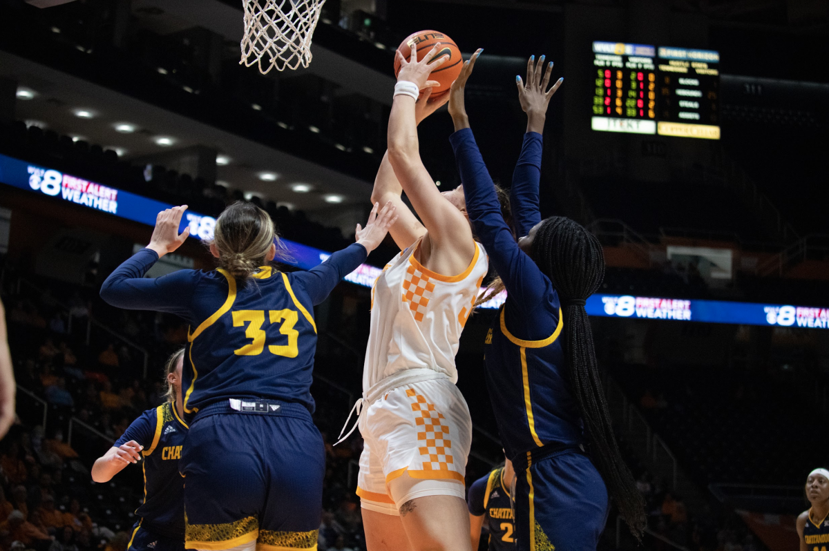 Marta Suarez, No. 33, attempts to finish through contact in the Lady Vols 69-39 win over UTC on Tuesday, Dec. 6.