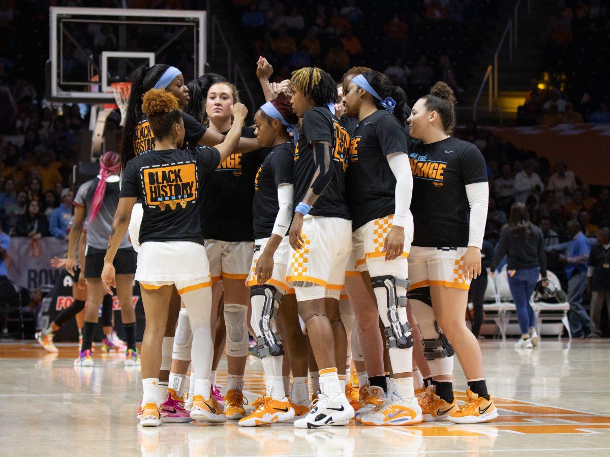 University of Tennessee Lady Volunteers basketball players huddle prior to a game against the University of South Carolina Gamecocks at Thompson-Boling Arena, Feb. 23, 2023.