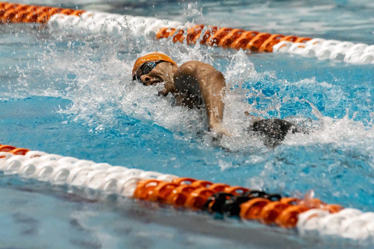 The UT men's swimming team competes in the freestyle heat during the prelims on Tuesday Feb. 15 for the 2022 SEC Swimming &amp; Diving Championship, hosted in Allan Jones Aquatic Center.