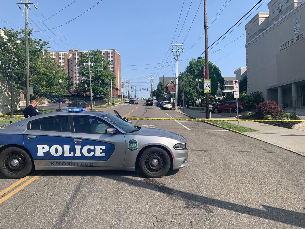 Photo of police car blocking off 16th St. in Knoxville near UT's campus.
