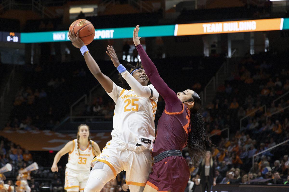 No. 25 Jordan Horston shoots a baby hook over Virginia Tech's No. 23 Kayana Taylor at Thompson-Boling Arena. Sunday Dec. 4, 2022.