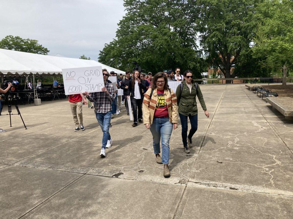 Graduate students, staff and faculty gather in McClung Plaza in support of a petition from United Campus Workers for higher base stipends for graduate assistants. 
