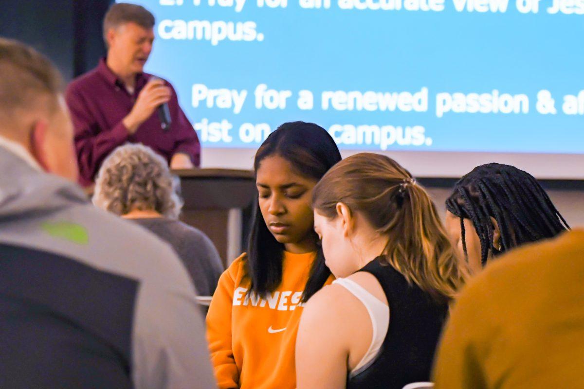 Students from various Christian ministries come together in fellowship and prayer for Collegiate Day of Prayer.
