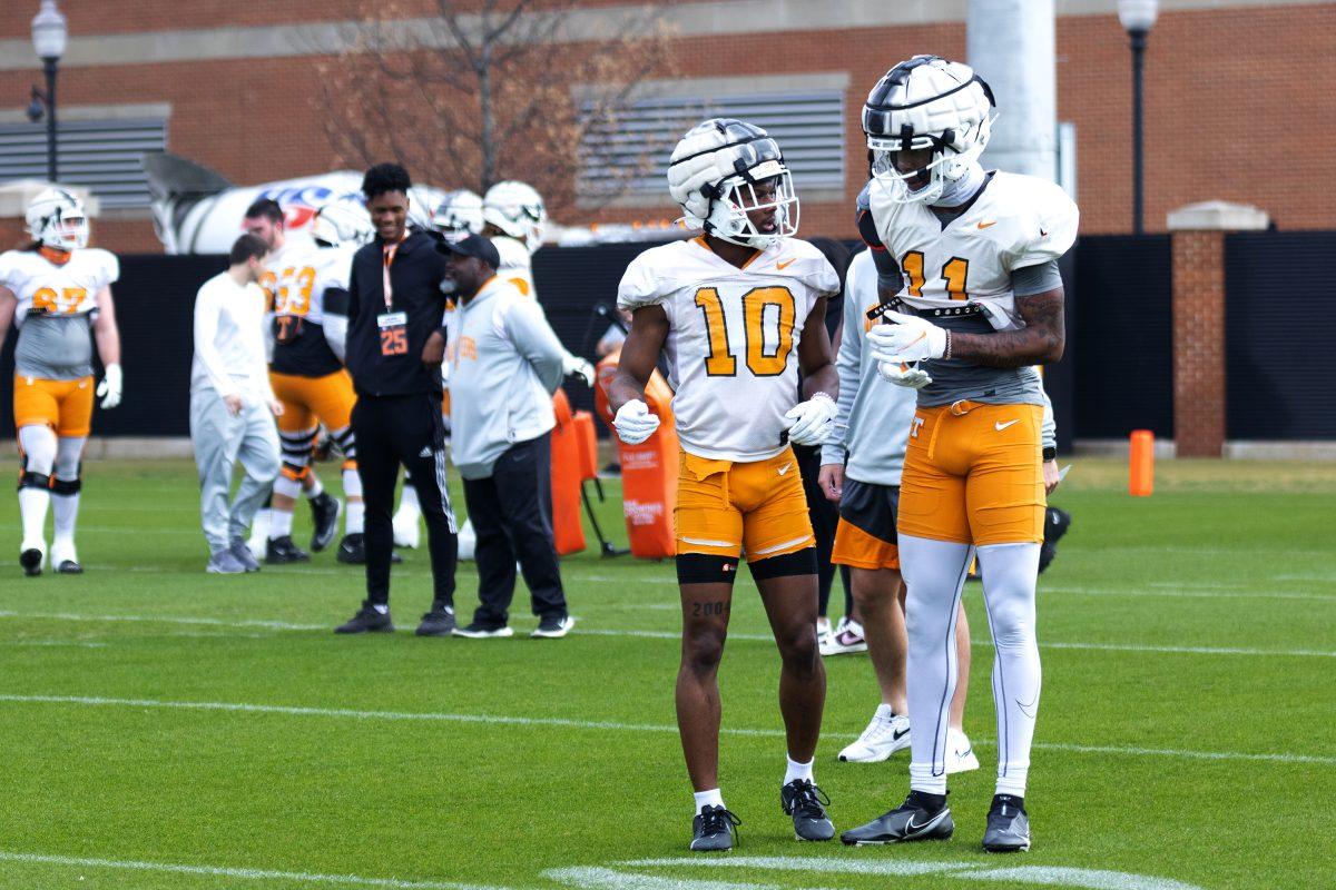 Tennessee receivers talk in between drills at the Vols' springs practice on March 23, 2023.