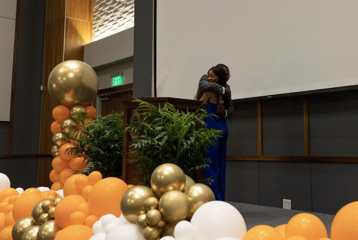 2022-23 Student Body President Jordan Brown and newly elected 2023-24 Student Body President Mark Hancock embrace after Hancock takes the oath of office on April 19. 