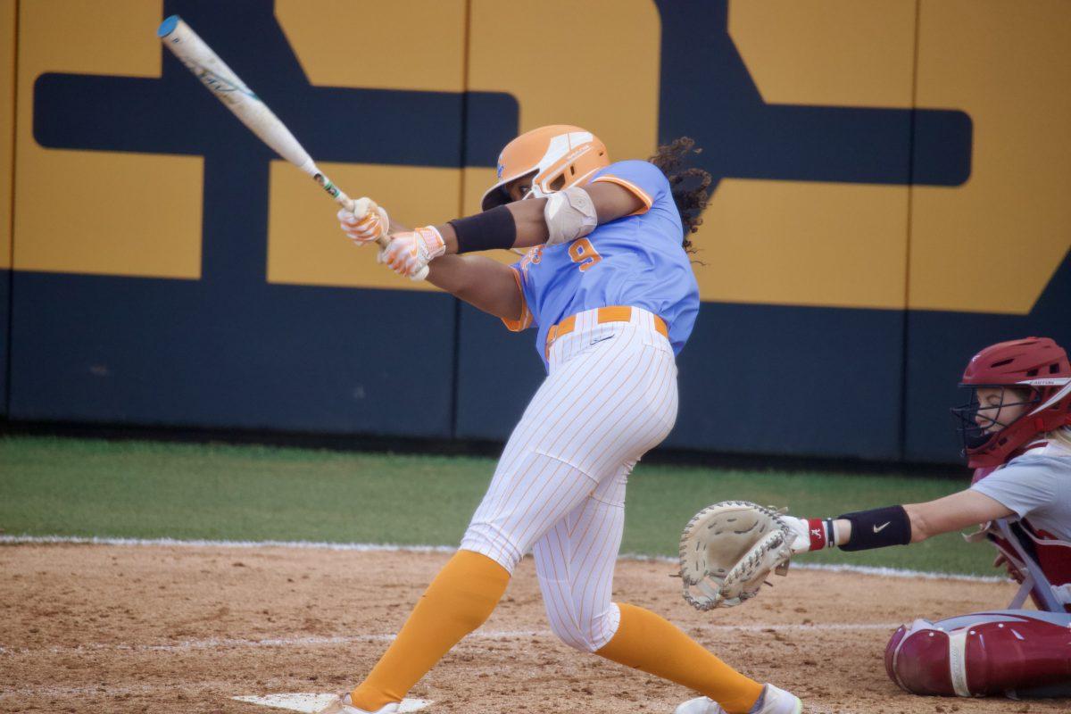 Kiki Milloy (9) bats against Alabama at Sherri Parker Lee Stadium. March 25, 2023.