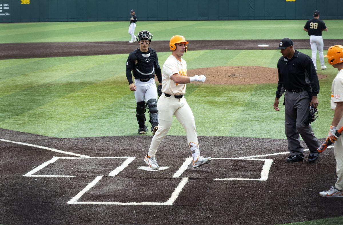 Griffin Merritt (10) stomps on homeplate after hitting a homerun against Vanderbilt at Lindsey Nelson Stadium. Sunday April 23, 2023.
