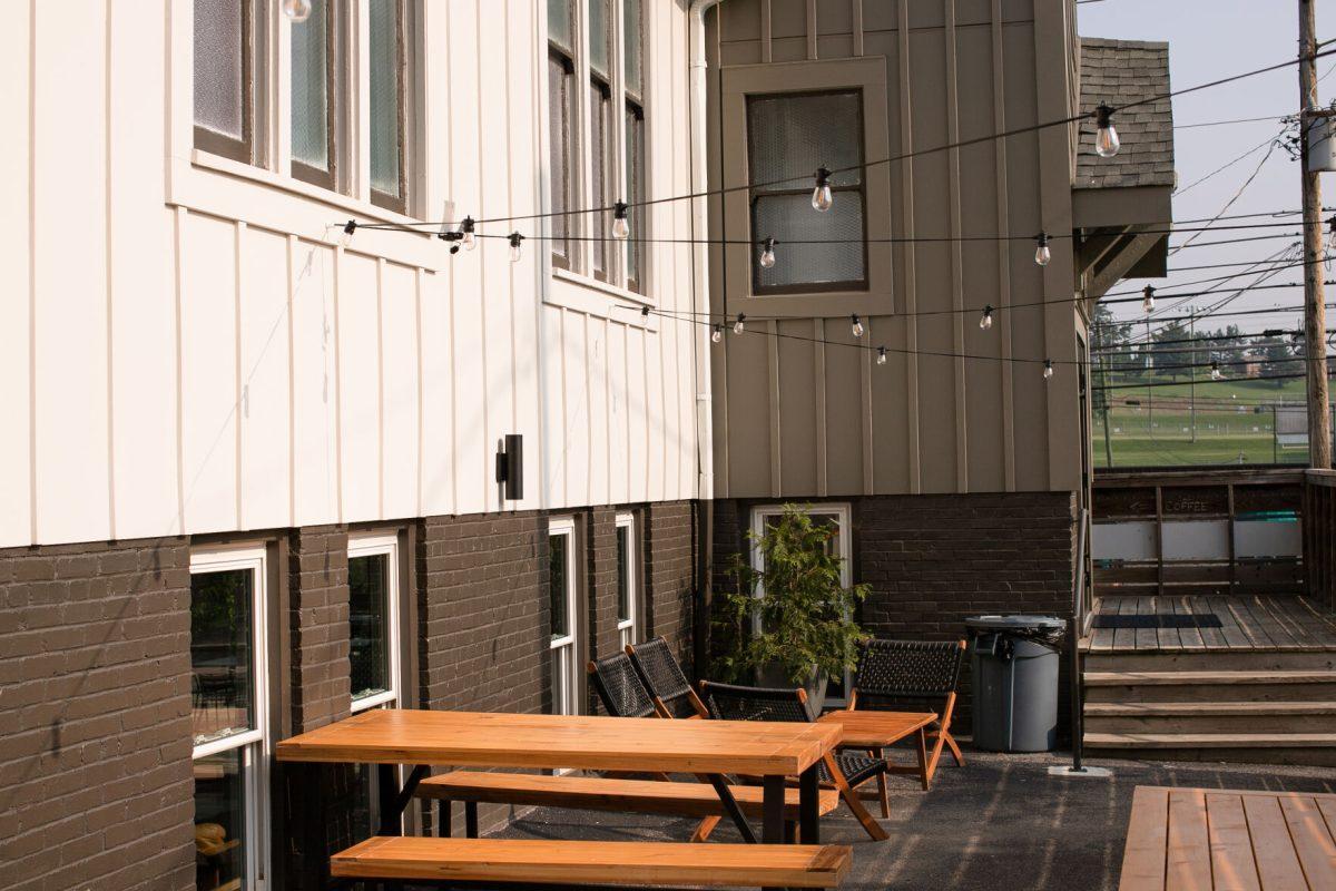 Seed Coffee Co. boasts a spacious outdoor space complete with picnic tables and soft lighting.