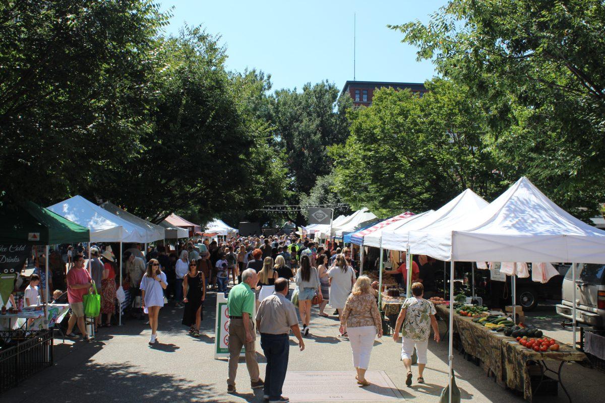 Patrons browse the Nourish Knoxville’s Farmers’ Market on a Saturday afternoon.