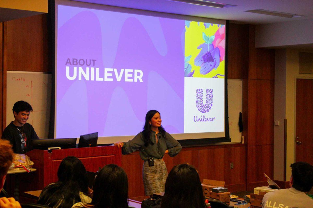 The Asian Business Club presents about the company Unilever at a meeting.