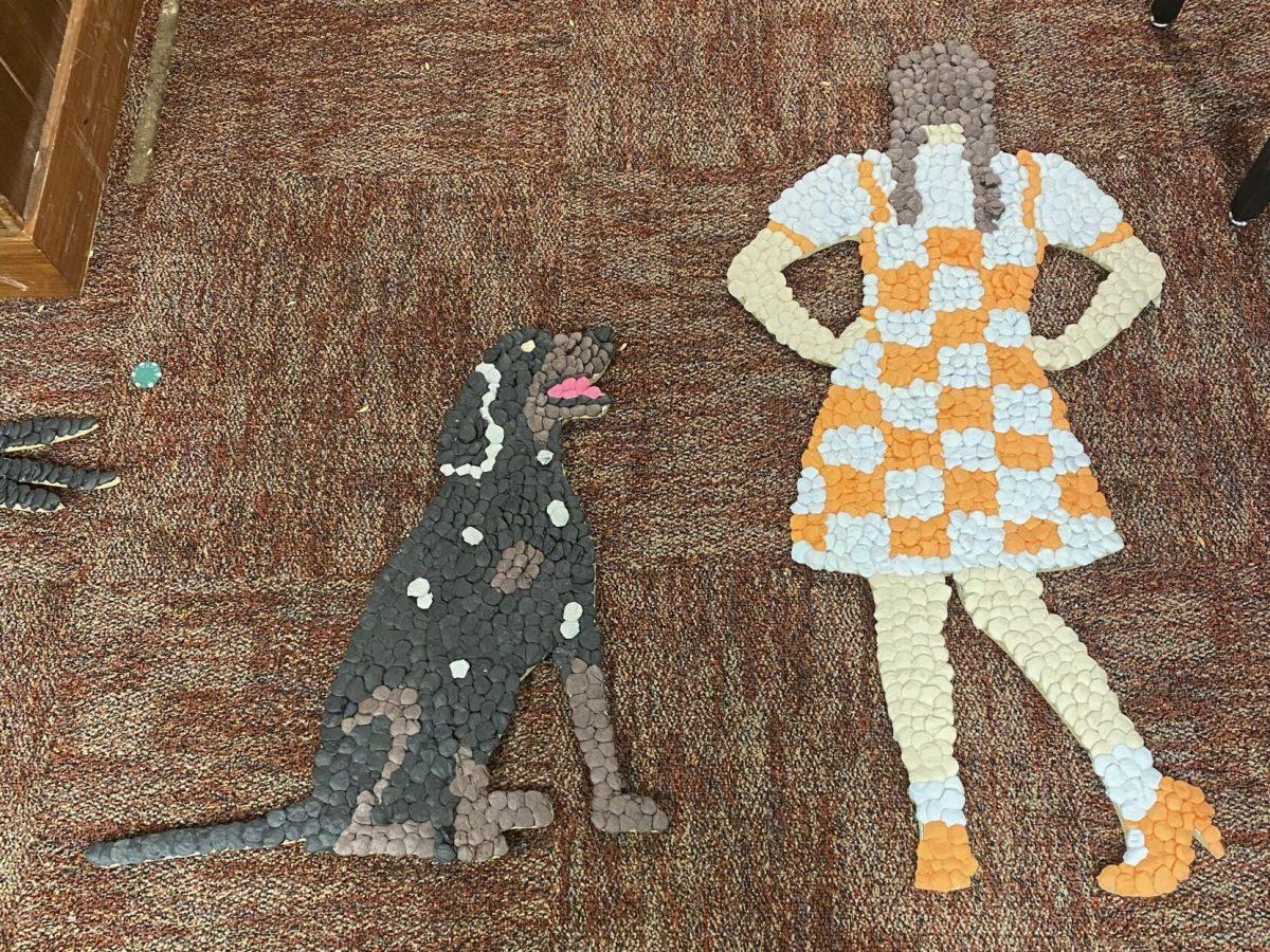 UT's Phi Mu and Pi Kappa Alpha chapters lean into UT's 2023 Homecoming theme of "There's No Place Like Neyland" with Tennessee-style Dorothy and Smokey-style Toto. Oct. 29, 2023. 