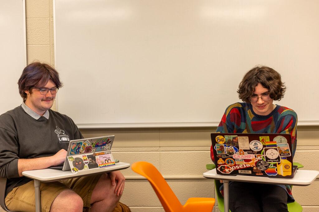 oSTEM member Jacob Hatfield (left) and oSTEM president Luke Leftwich (right) study together at a meeting in HSS. Thursday, Oct. 12, 2023. 