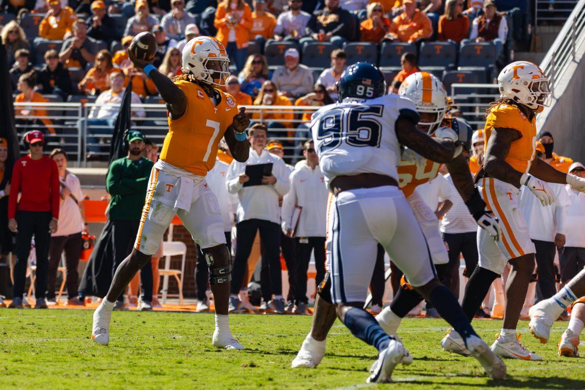 Quarterback Joe Milton III (7) prepares for a pass in the first quarter against UConn. Saturday, Nov. 4, 2023.