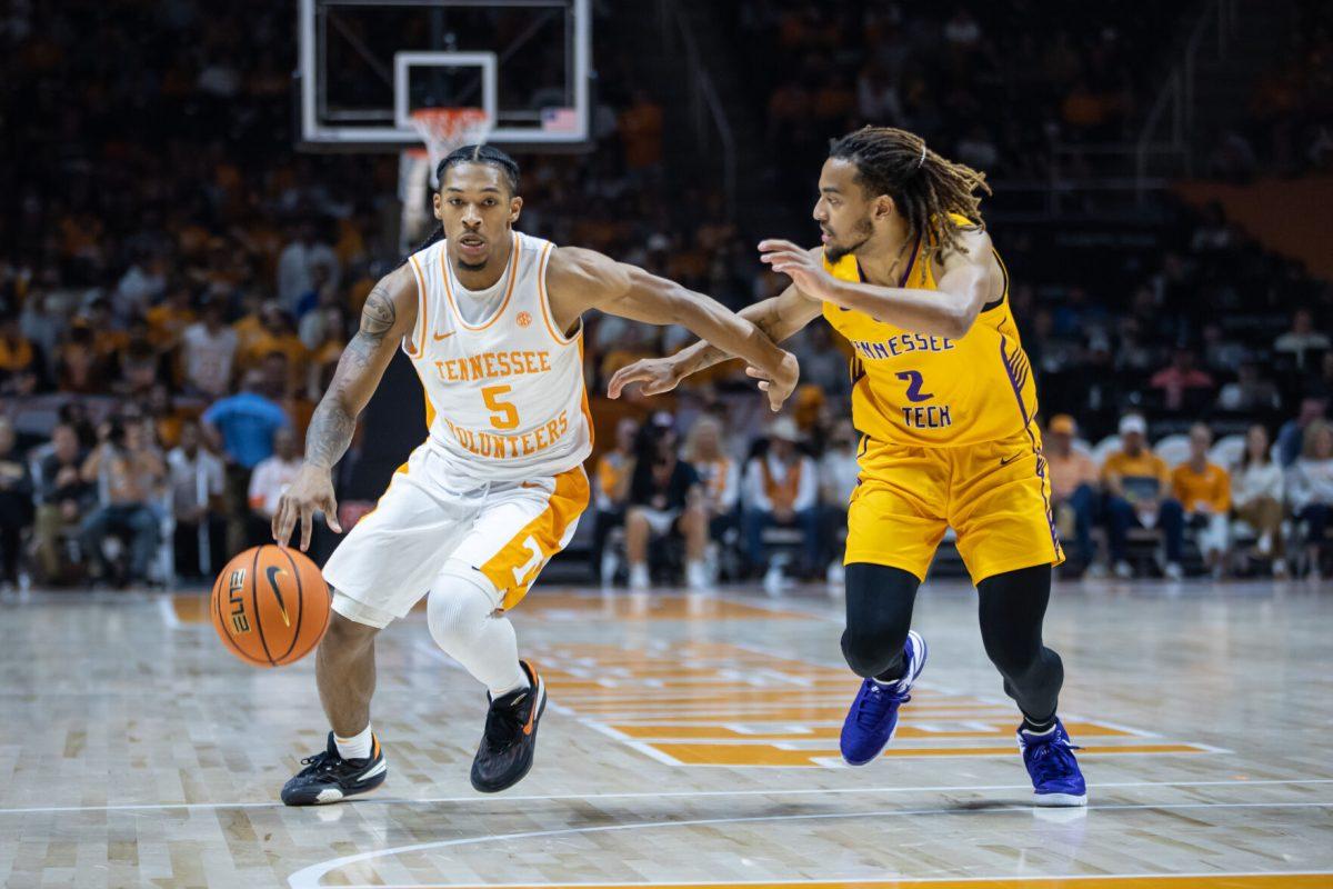 Zakai Zeigler (5) drives to the rim during a game against Tennessee Tech University at Thompson-Boling Arena at Food City Center. Monday, Nov. 6, 2023.