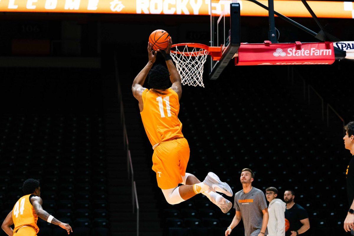 Tobe Awaka (11) gets a bucket at practice at the Food City Center. Thursday, Oct 26, 2023.