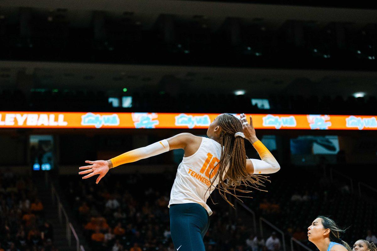 Jenaisya Moore (18) scores in the Food City Center. Sunday, Nov, 12, 2023. Parker Phegley