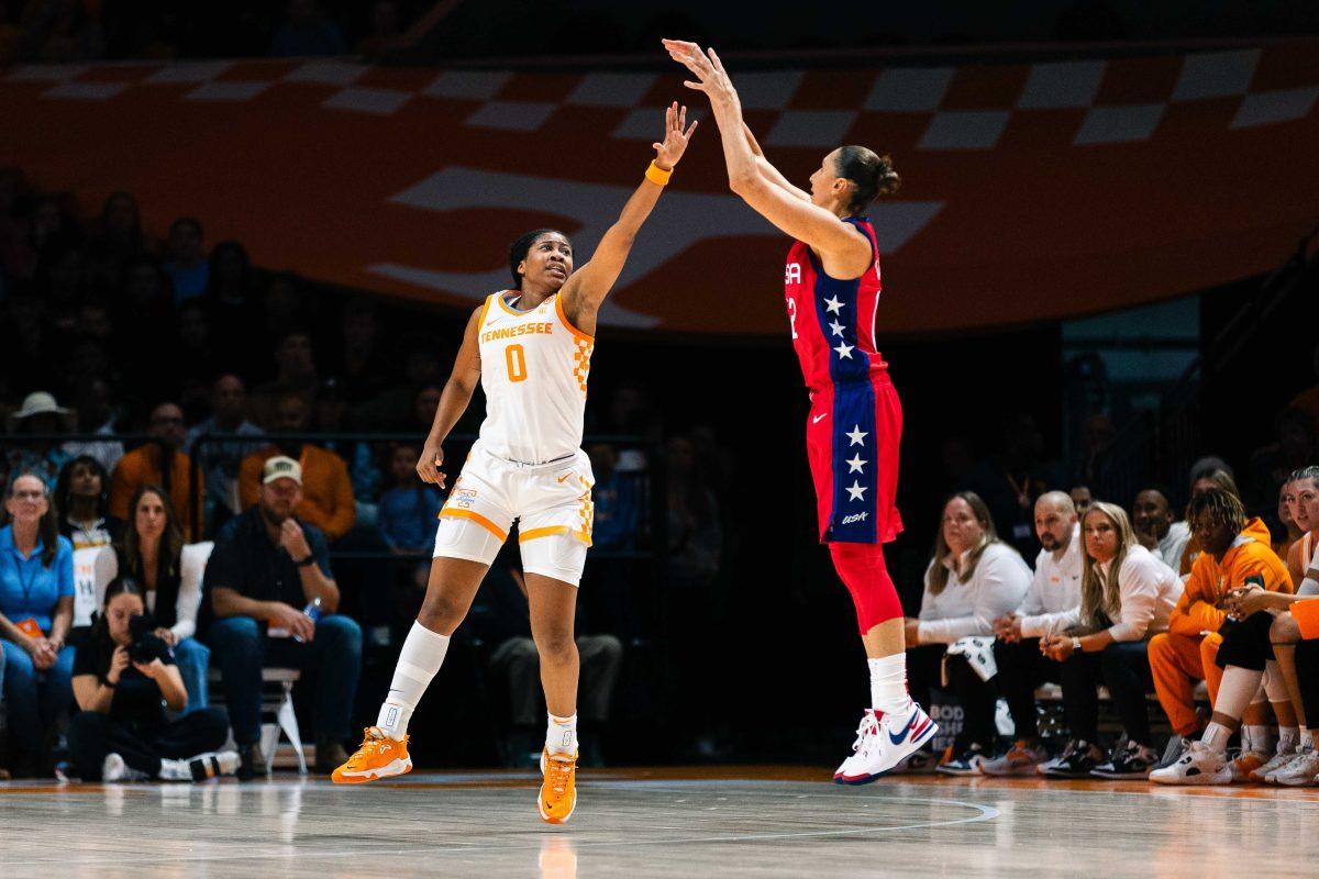 Diana Taurasi scores over Jewel Spear (0). Nov 5, 2023. (Parker Phegley)