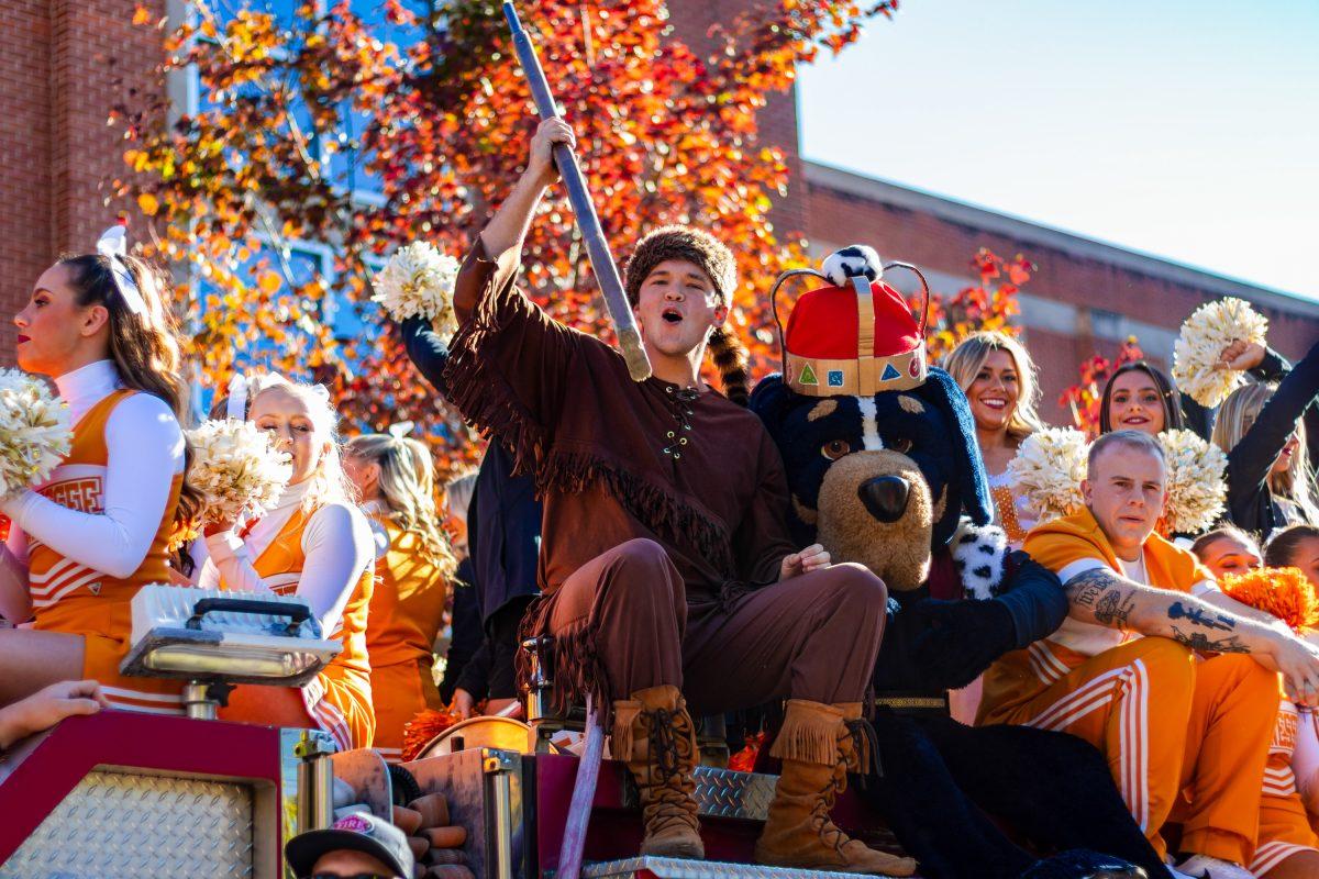 Davey Crockett and Smokey ring in Homecoming with Vol Cheer on Nov. 3, 2023.