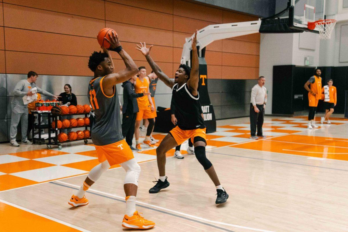 Tobe Awaka (11) being guarded by DJ Jefferson in practice. Thursday, Nov. 2, 2023.