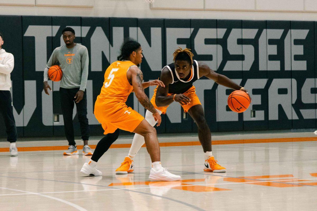 Jahmai Mashack (15) guarded by Zakai Ziegler (5) during practice in Pratt Pavilion. Thursday, Nov. 2, 2023.