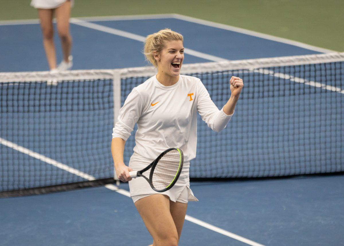 Elza Tomase celebrates a point during a doubles match against the University of Tennessee at Chattanooga at Goodfriend Tennis Center. Sunday, Jan. 14, 2024.