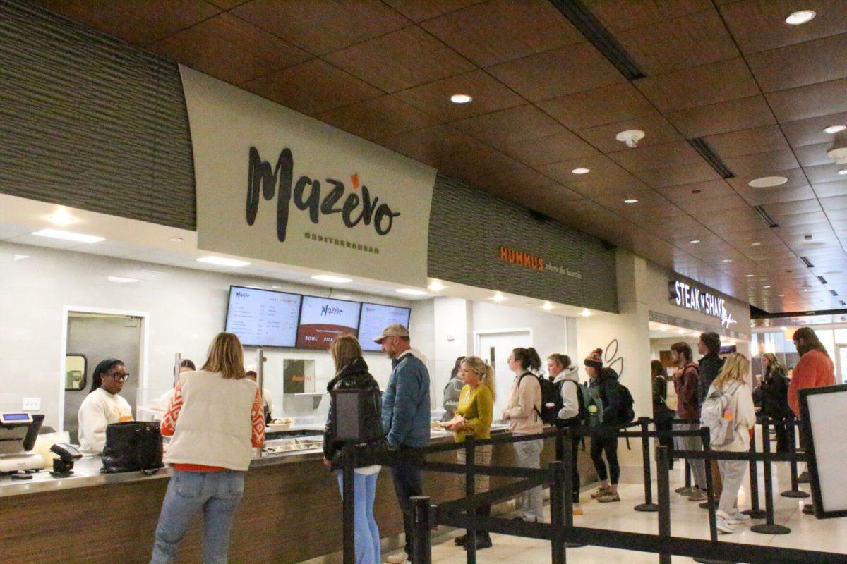 Students wait their turn to try the new mediterranean restaurant "Mazevo" at the Student Union. Tuesday, Jan. 30, 2024.
