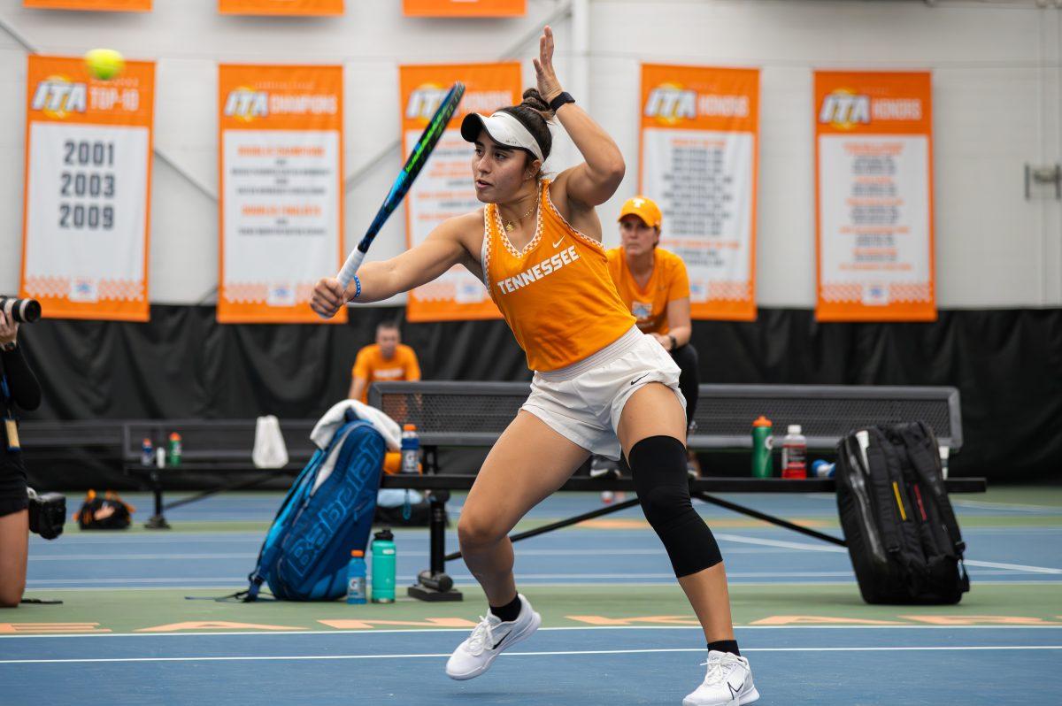 Sofia Cabezas hits a backhand volley to close out a point against Vanderbilt at Goodfriend Tennis Center. Friday, Jan. 26, 2024.