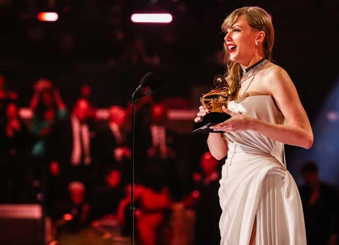 Taylor Swift made history by winning her fourth the Album of the Year award at the 66th Annual Grammys.