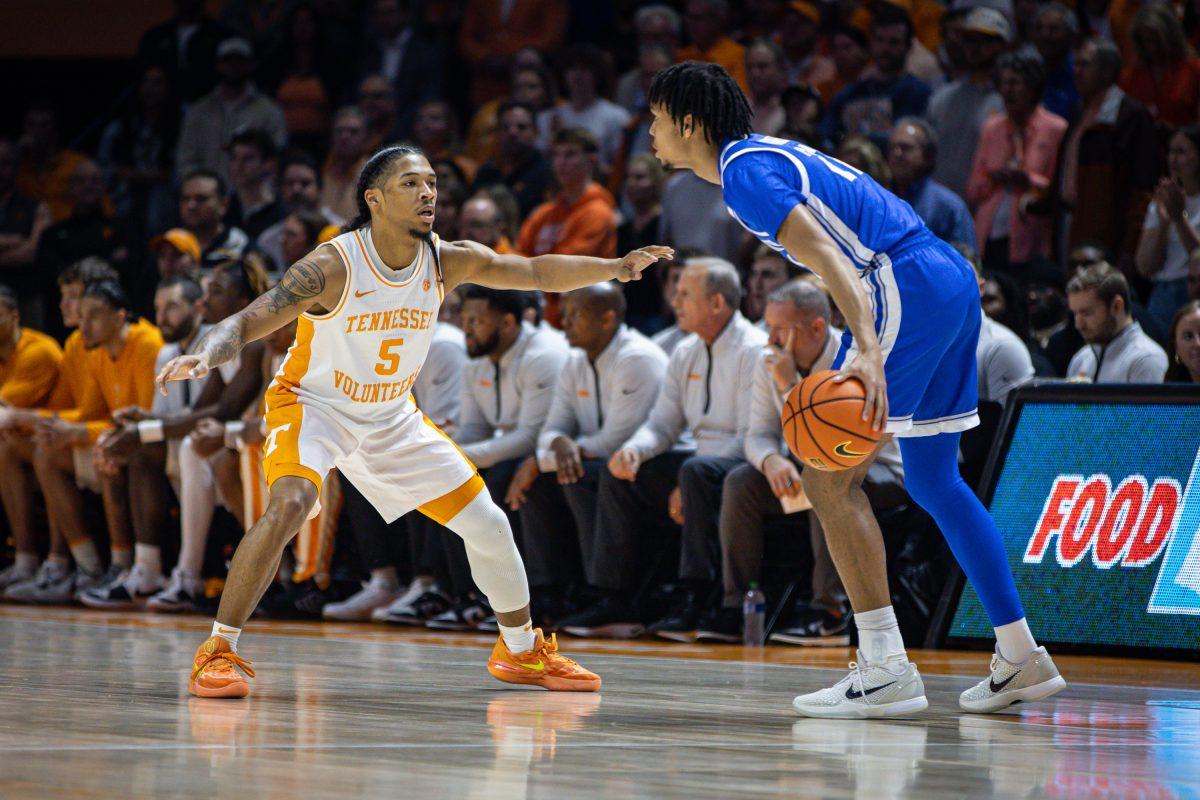 Zakai Zeigler (5) defends an opponent during a game against Kentucky at Food City Center. Saturday, March 9, 2024.