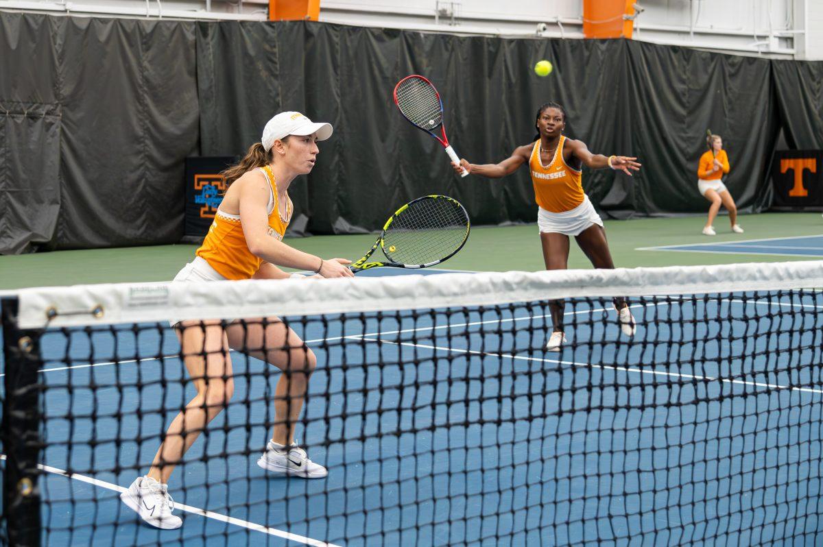 Esther Adeshina (right) volleys an incoming Vanderbilt shot at the Goodfriend Tennis Center. Friday, Jan. 26, 2024.
