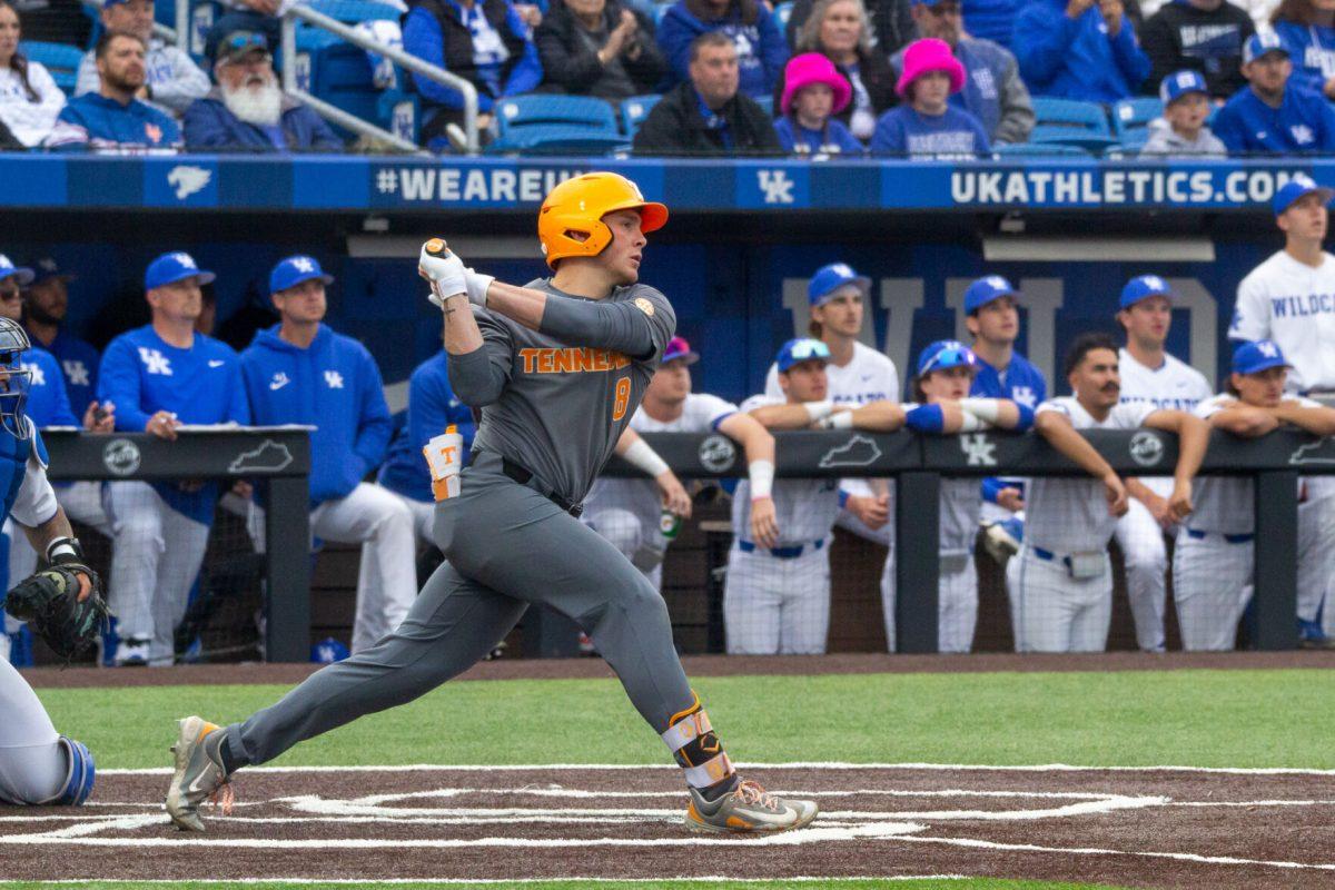 Dylan Dreiling (8) swings during a game against Kentucky at Kentucky Proud Park. Friday, April 19, 2024.