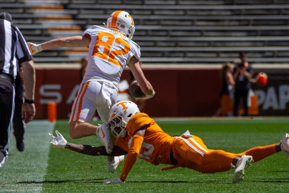Dayton Sneed (82) evades a defender during the Orange and White game at Neyland Stadium. Saturday, April 13, 2024.