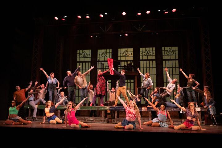 The ensemble cast of the Clarence Brown Theatre's 2024 production of "Kinky Boots" stars Omari Collins as Lola and Wes Williams as Charlie.