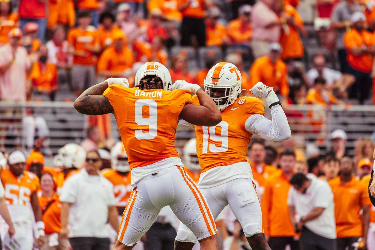 Tyler Baron (9) and Joshua Josephs (19) celebrate a successful defensive play against Texas A&amp;M at Neyland Stadium. Saturday, Oct. 14, 2023.