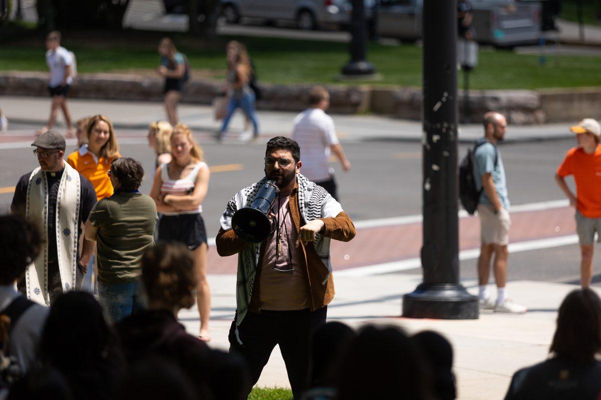 Students and community members gather in protest outside the College of Law. Wednesday, May 1, 2024.
