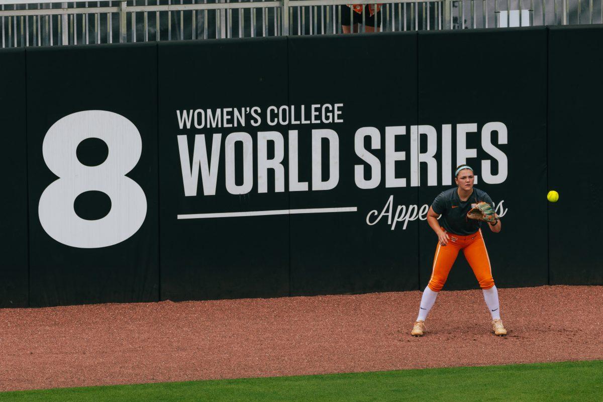 Ella Dodge (12) takes the field before a game against Alabama at Sherri Parker Lee Stadium. Friday, May 24, 2024.