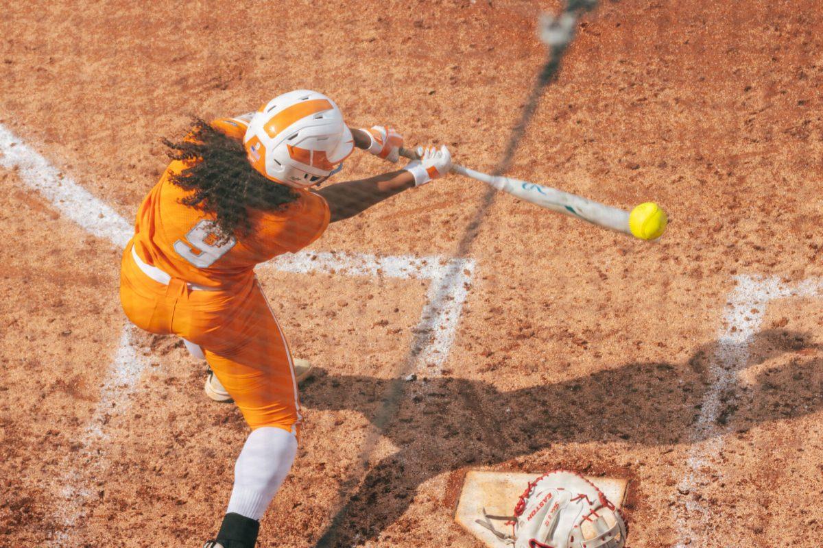 Kiki Miloy (9) swings during a game against Alabama at Sherri Parker Lee Stadium. Friday, May 24, 2024.