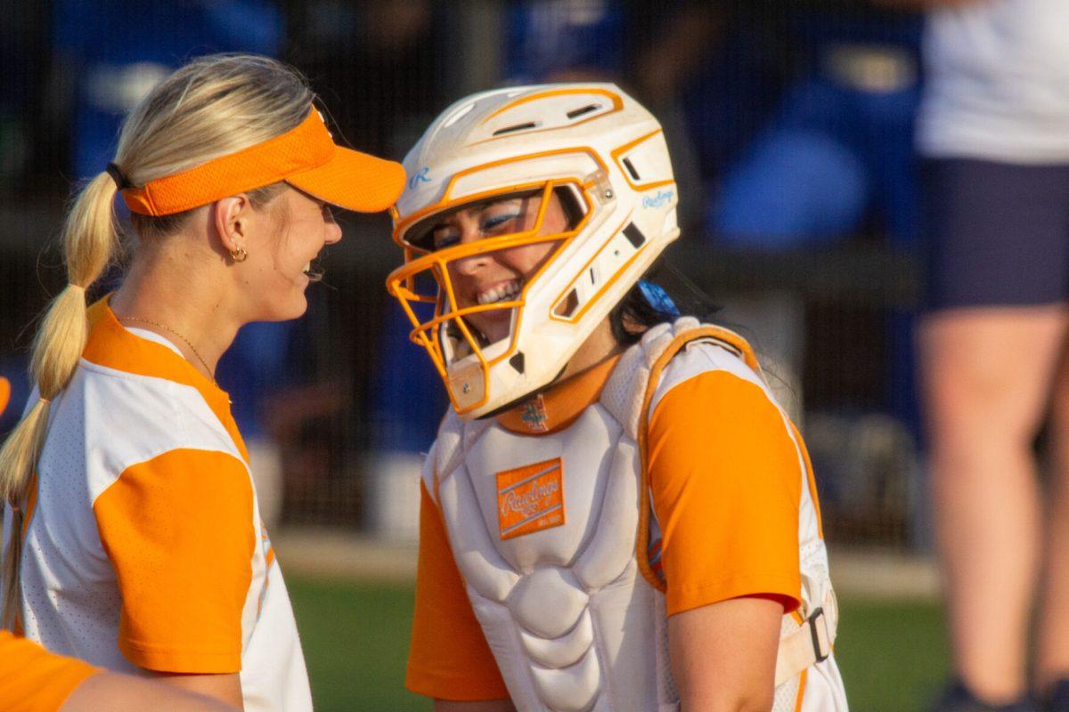 Karlyn Pickens (23) and Sophia Nugent (7) smile during a game against Kentucky at Sherri Parker Lee Stadium. Thursday, May 2, 2024.