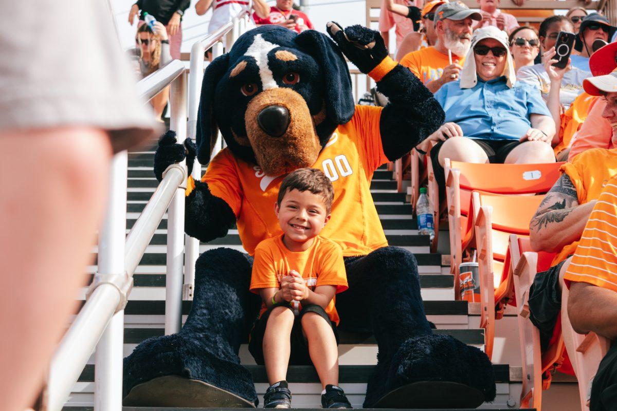 Smokey takes photos with fans during a game against Alabama at Sherri Parker Lee Stadium. Friday, May 24, 2024.