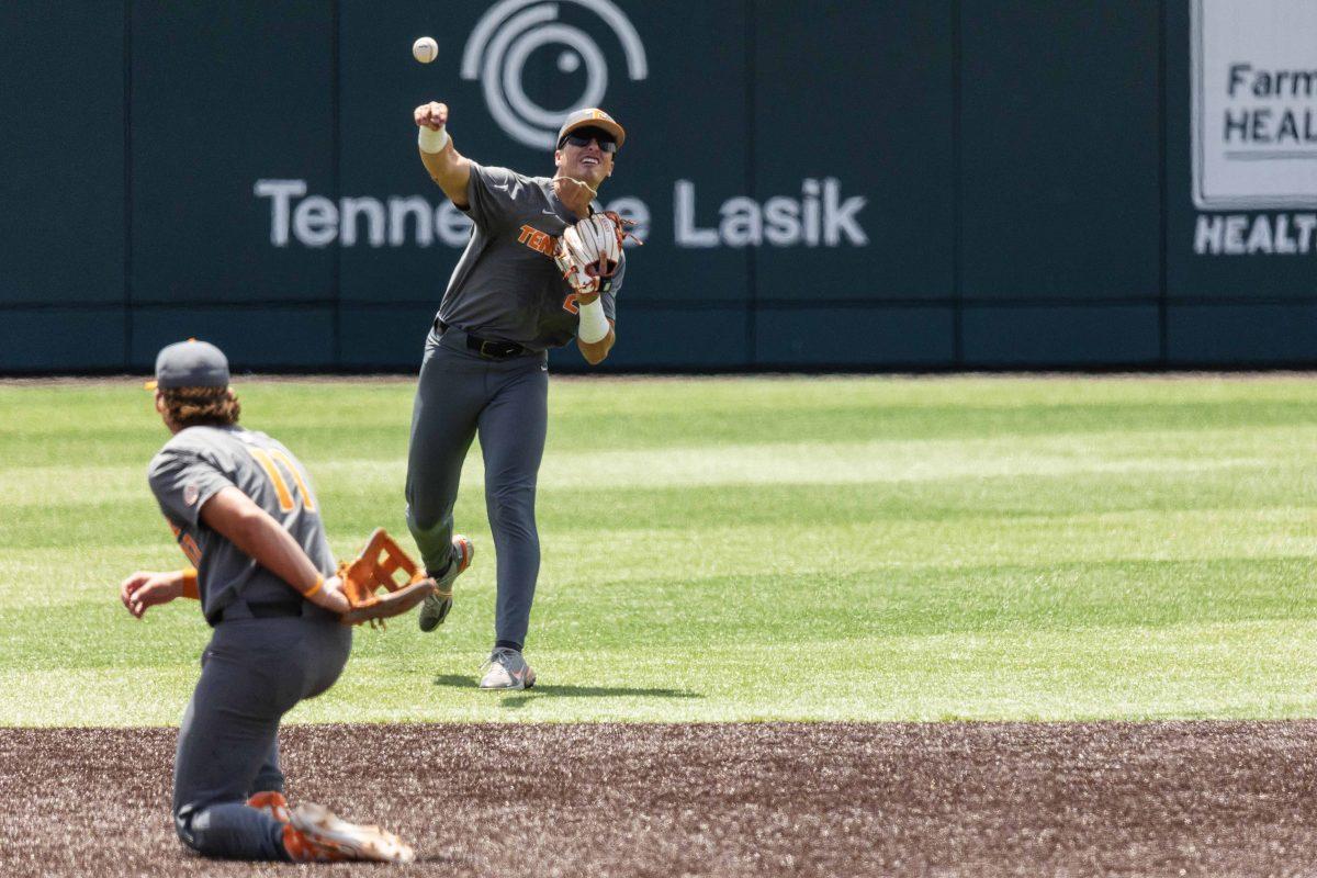 Dean Curley (23) throws to first during game against Evansville at Lindsey Nelson Stadium. Saturday, June 8, 2024.
